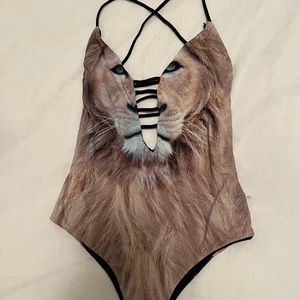 San Lorenzo swimsuit. Reversible - black and lion print